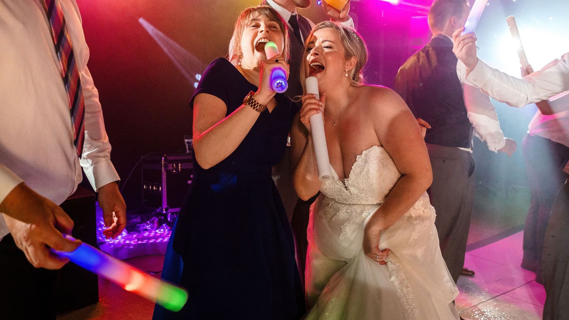 Wedding Entertainment Bride Having Fun and Signing on the Dancefloor